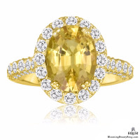 Very Fine Oval Cut Yellow Sapphire and Diamond Engagement Ring