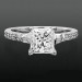 Round Pave and Channel Set Baguette Diamond Engagement Ring Laying Down